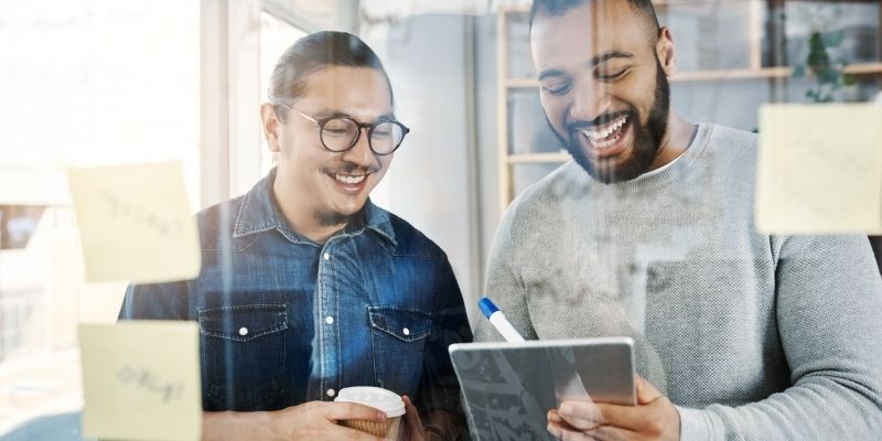 happy business owners getting reviews